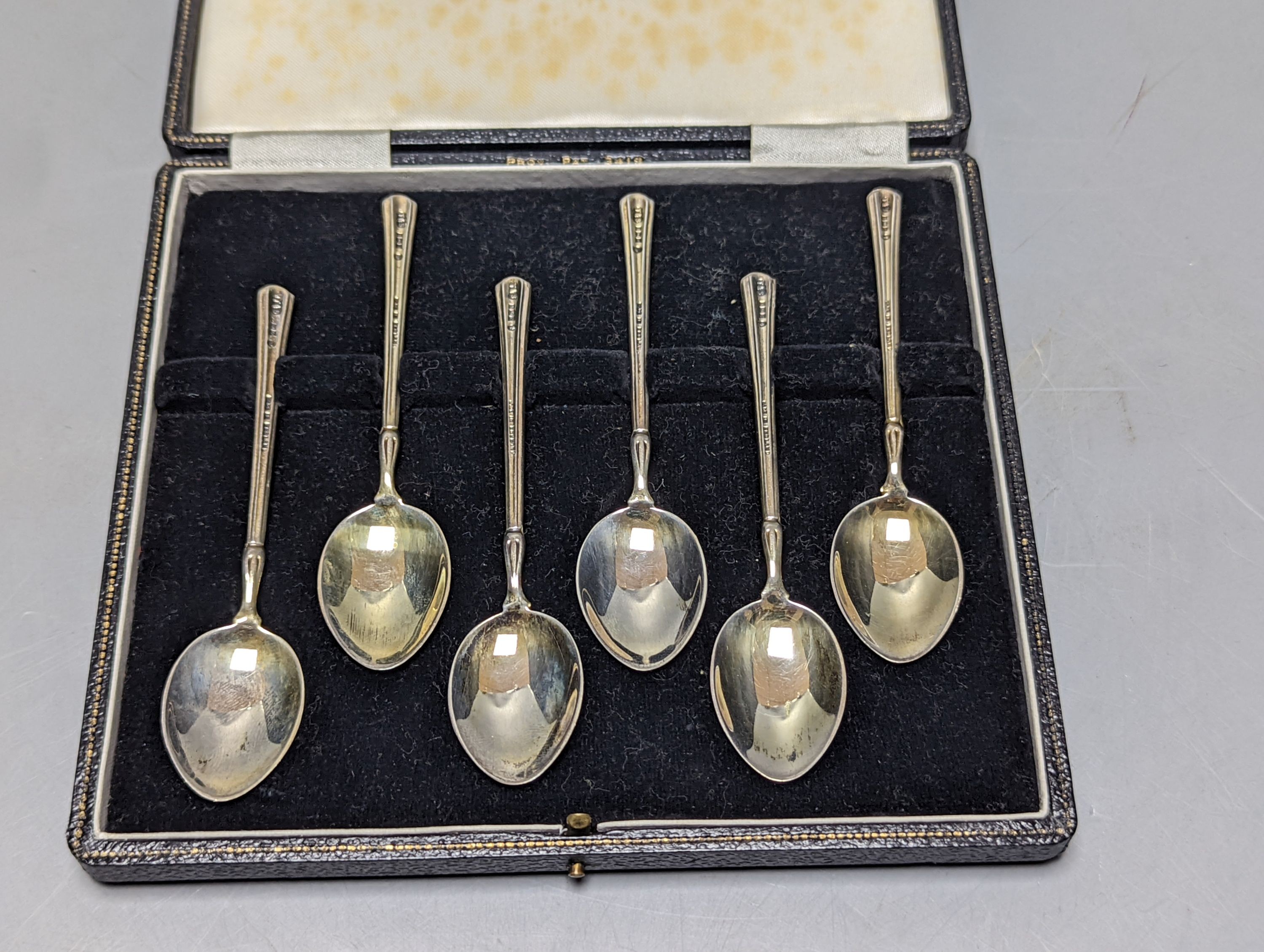 A cased set of six silver and three colour enamelled coffee spoons, Turner & Simpson, Birmingham, 1952/53.